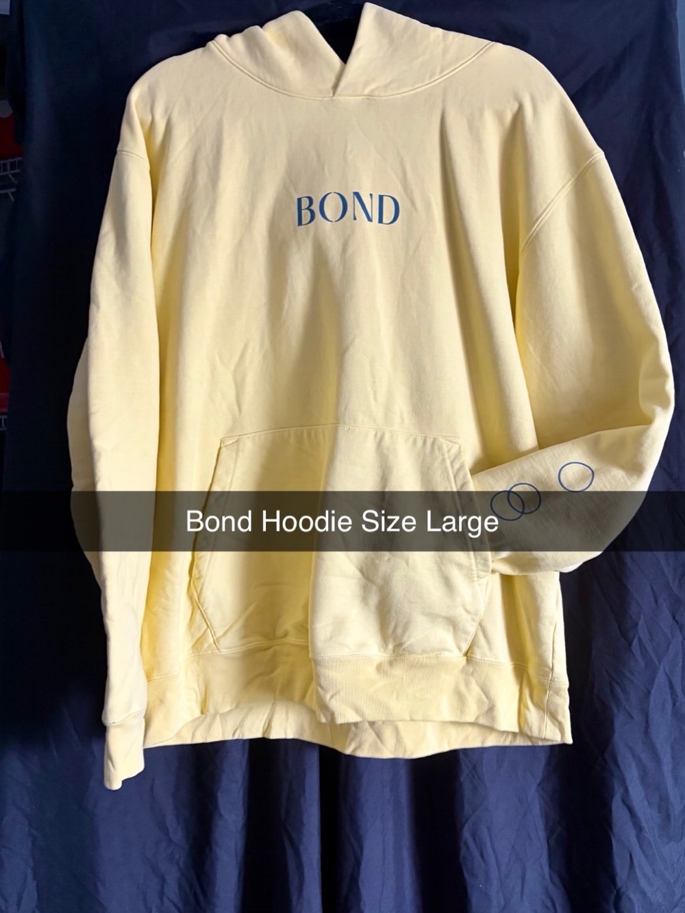 Bonds Pale Yellow Hoodie with Blue 'BOND' Print